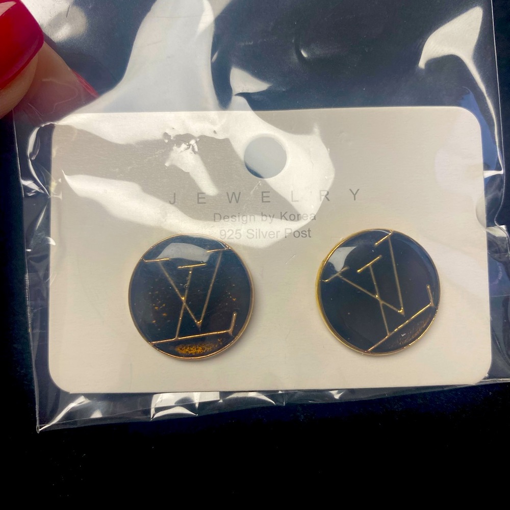 L V black circle earrings